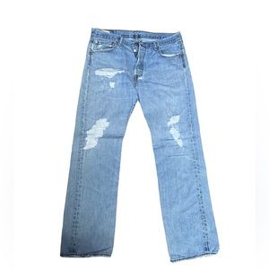 Levi’s 501 button fly distressed light wash cotton straight leg jeans unisex